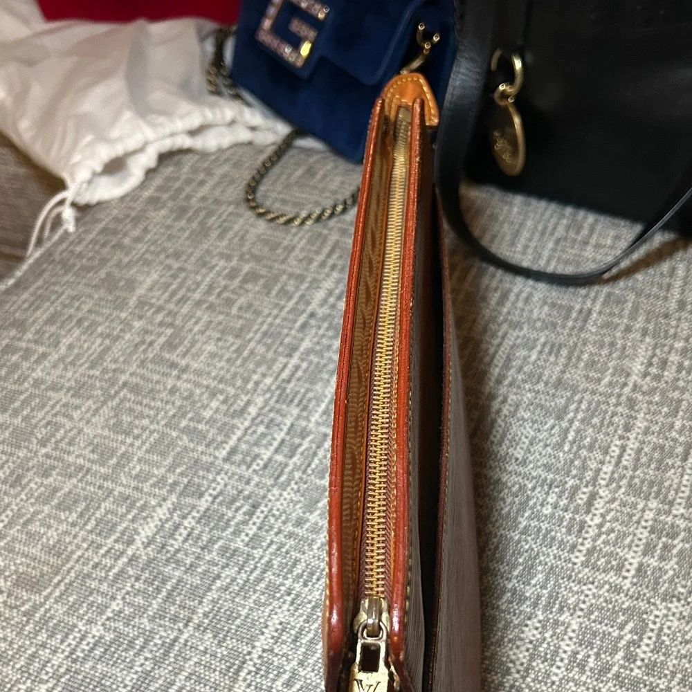 268. Louis Vuitton Epi Brown Pochette Homme